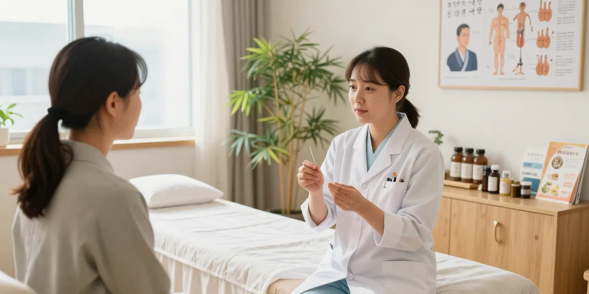 Consultation at 수원교통사고한의원 with acupuncturist guiding patient through treatment options in a calming clinic.
